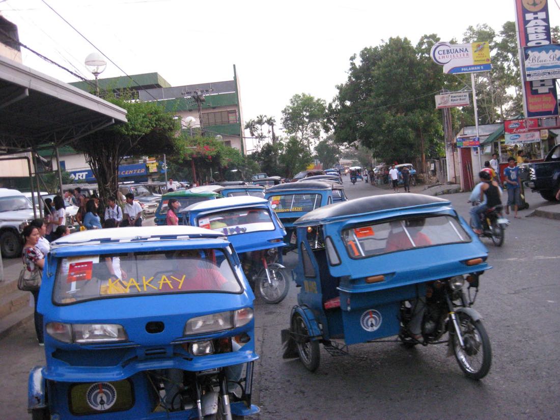 Tricycles on the street in Puerto Princesa, the citys actual transport system